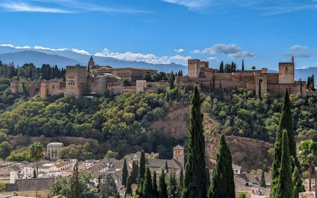 The Alhambra on its hill with the Sierra Nevada behind, seen from the Albaicín