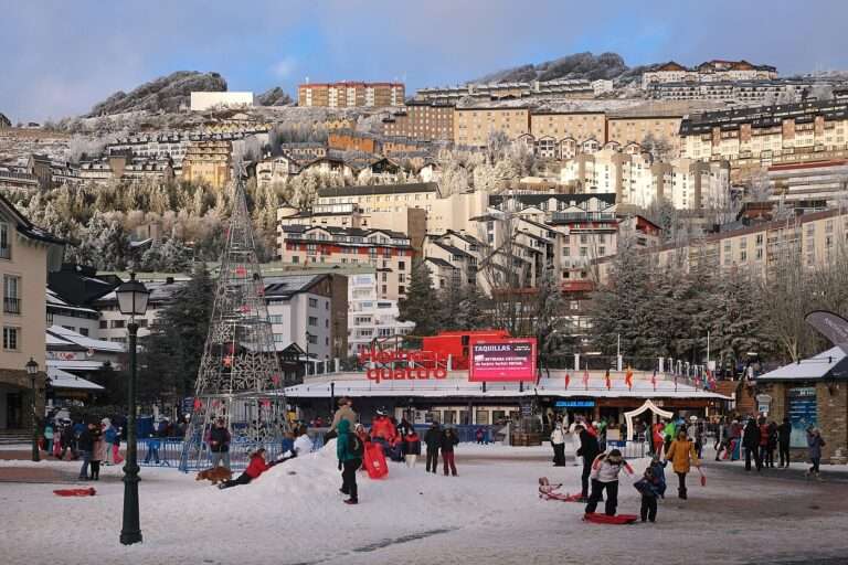 Snow-dusted Pradollano village stacked on the hillside at the Sierra Nevada ski station
